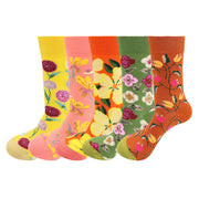 Collection of flower-themed crew socks, including chrysanthemums, on a white background.